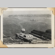 View of Puget Sound with ferry and military ships in background (ddr-densho-466-801)