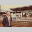 Man standing in train station (ddr-densho-426-173)