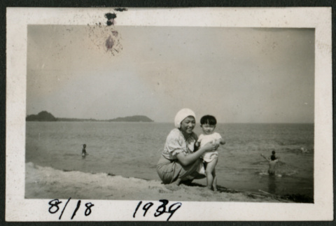 Woman and child on beach (ddr-densho-359-1019)