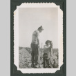 Two men working in a field (ddr-densho-471-192)
