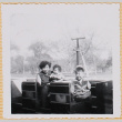 Yoshiko, Susan and William Shiomi on play train (ddr-densho-522-233)