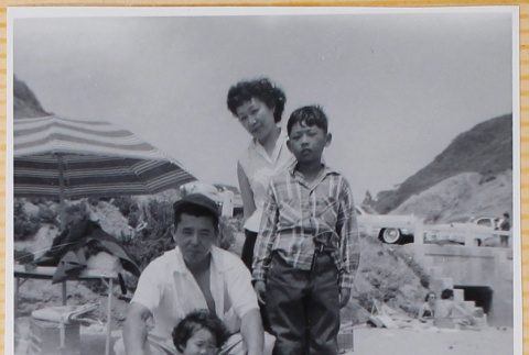 Family on beach (ddr-densho-522-294)