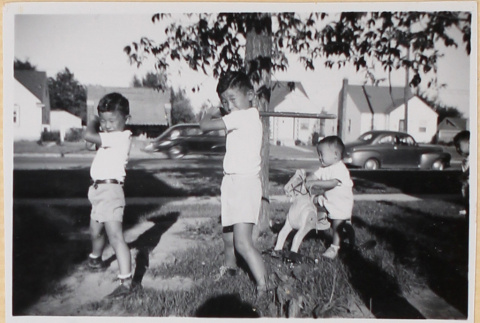 Three children playing (ddr-densho-522-71)