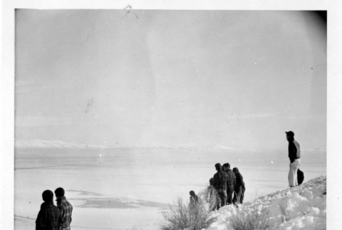 People on hillside viewing camp (ddr-csujad-26-73)