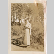 Woman standing in garden (ddr-densho-426-1441)