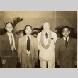 Four men posing for a photograph (ddr-njpa-1-2451)