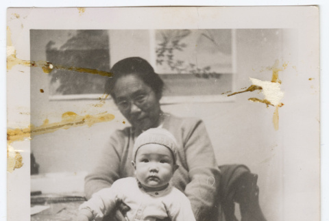 Woman holding a baby (ddr-densho-433-572)