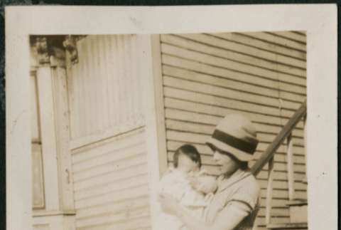 Woman and baby pose on boardwalk (ddr-densho-359-620)