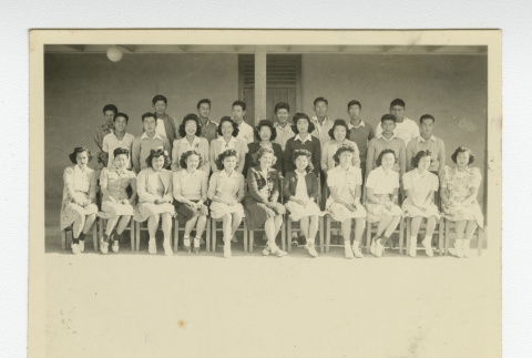 Large group of Nisei men and women with a teacher (ddr-csujad-44-24)