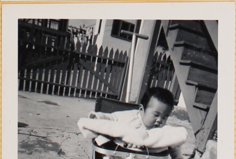 Susan Shiomi in stroller (ddr-densho-522-137)