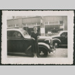 Woman in front of car (ddr-densho-359-157)