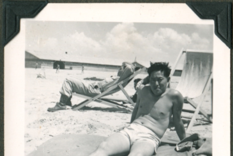 Soldier relaxing on the beach (ddr-densho-201-642)