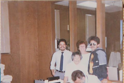 Five  people behind a desk (ddr-densho-426-1199)