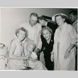 Christine Jorgenson with a group of unidentified people (ddr-densho-367-166)