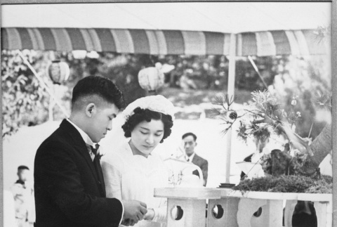 Tak Kubota and Kiyo Kaneko's wedding ceremony in the Garden (ddr-densho-354-1541)
