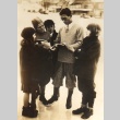 Kauyoshi Orimatsu, an Olympic skater signing autographs (ddr-njpa-4-1882)