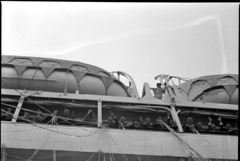 View of ship from dock, with streamers (ddr-densho-426-1680)