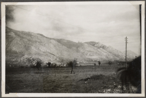 View of field with hillside (ddr-densho-466-124)