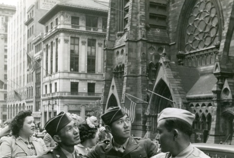 Soldiers riding a tour bus in New York City (ddr-densho-22-467)