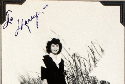 Woman in tall grass (ddr-densho-587-47)