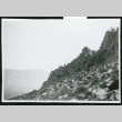Photograph of the side of a mountain with snow and sagebrush (ddr-csujad-47-292)