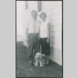 Agnes and Chester Sakura with dog (ddr-densho-523-305)
