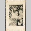 A baby with gifts (ddr-densho-321-1122)