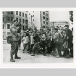 Japanese schoolchildren and American Sgt. Charles Roman (ddr-densho-1007-243)