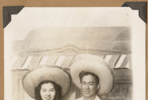 Gary Kikawa and woman wearing sombreros (ddr-densho-542-68)