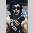 Jim Endo with a camera (ddr-densho-336-1123)