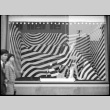 Large window display with dark striped background (ddr-densho-426-2290)