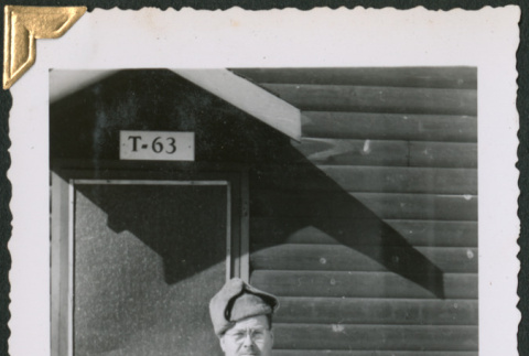 Man standing outside barracks (ddr-densho-434-343)