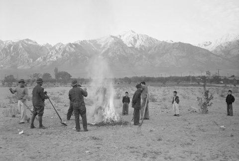 Japanese Americans burning leaves (ddr-densho-93-30)