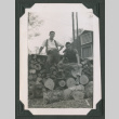 Two men on log pile (ddr-densho-471-55)