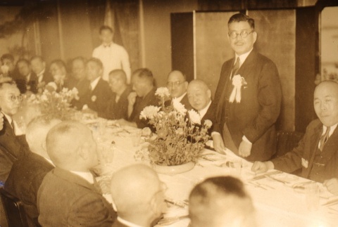 Man giving a speech at a dinner party (ddr-njpa-4-2550)