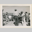 Group holding flags at a picnic (ddr-densho-37-1075)