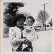 Yoshiko Shiomi holding Susan Shiomi (ddr-densho-522-158)