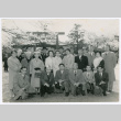 Mitsuye Yabe and Tour Group Pose in Front of Trees (ddr-ohs-1-122)