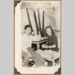 Gary Kikawa and woman at a table (ddr-densho-542-67)