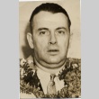 A man wearing leis (ddr-njpa-1-1373)