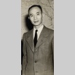 Man posing in front of a map (ddr-njpa-2-962)