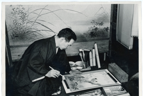 Photograph of Kango Takamura working on a painting (ddr-csujad-47-69)