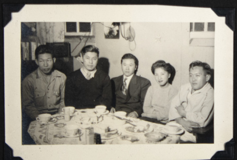 Group at a dining table (ddr-densho-542-593)