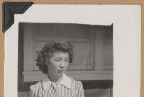 Young woman in a striped outfit (ddr-densho-542-245)