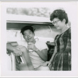 Tomoye (Nozawa) Takahashi and Norman Takahashi by car (ddr-densho-426-2201)