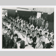 Men with leis swearing in at Hilo Armory (ddr-densho-1007-396)