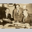 Lewis W. Douglas, Howard L. Vickery, and Emory S. Land reviewing ship models (ddr-njpa-1-183)