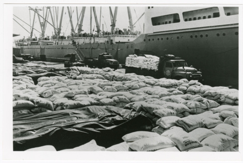 Food aid arrives in Naha, Okinawa as part of Food-for-Freedom program (ddr-densho-1007-126)