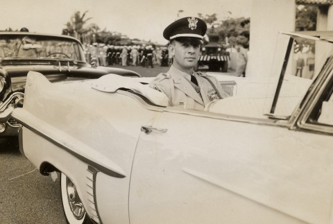 Military leader sitting in a car (ddr-njpa-2-1054)