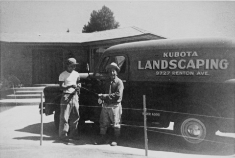 Fujitaro Kubota and George Yano in front of truck (ddr-densho-354-19)